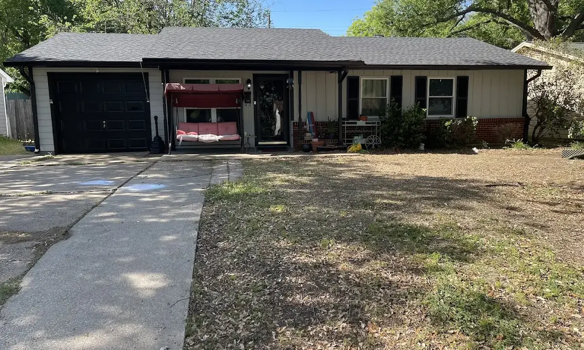 Asphalt Shingle Roof Repair crew at work on a residential roof in Panama City Beach